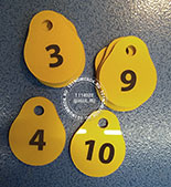 Номерки для ключей металлик №31. Цвет номерка золото металлик. Форма номерка - в виде капли.