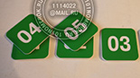 Номерки для шкафов в раздевалку №16. Зеленый композитный пластик. Нанесение - гравировка на фрезерном оборудовании.
